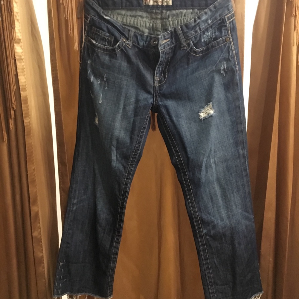 Bke distressed jeans.  Like new condition.